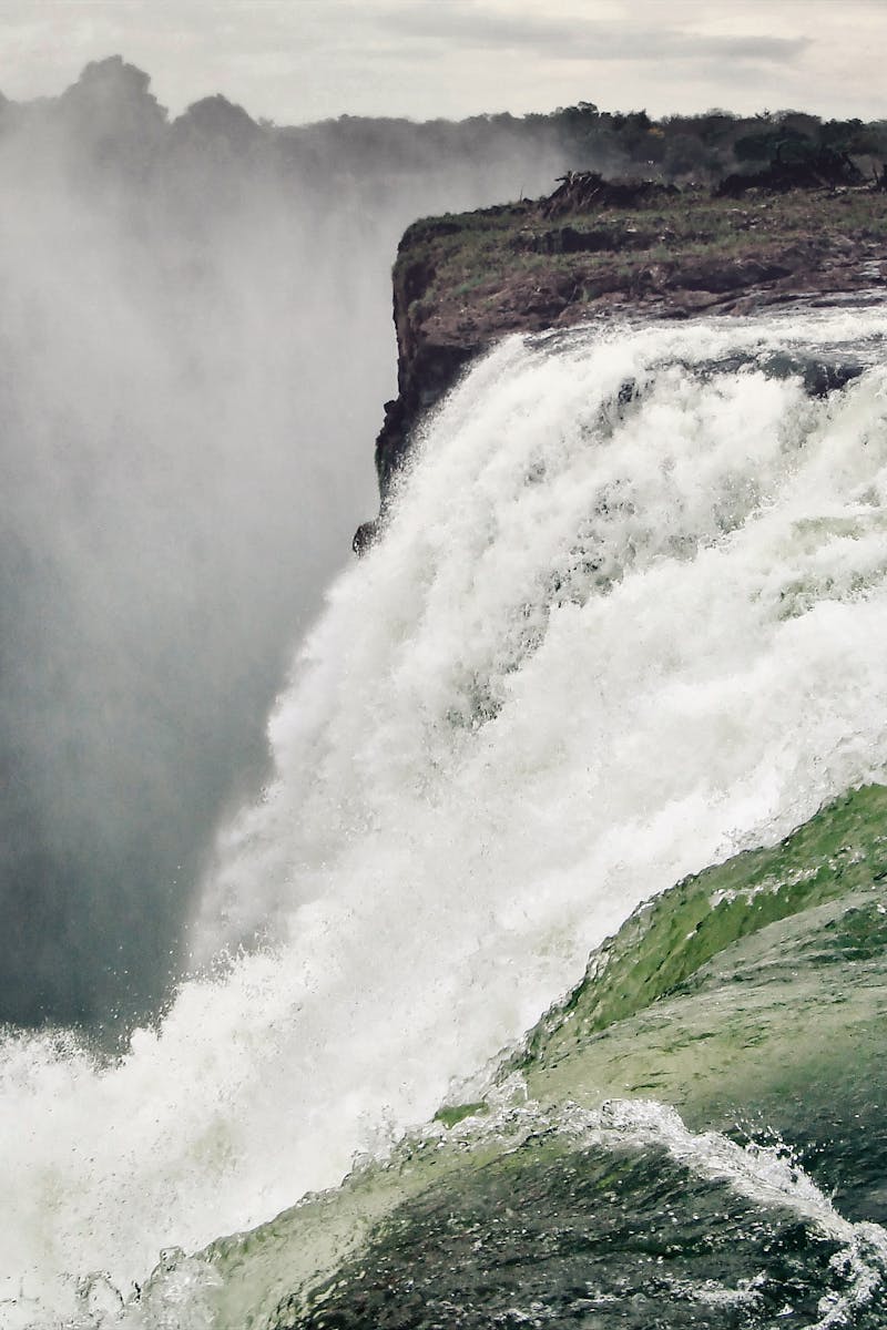 Stunning photo capturing the powerful flow and grandeur of Victoria Falls, Zimbabwe.